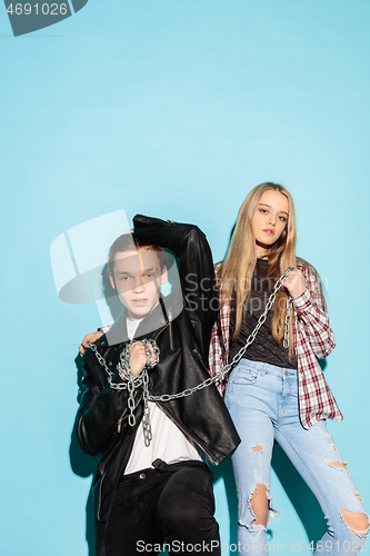 Image of Close up fashion portrait of two young pretty hipster teens