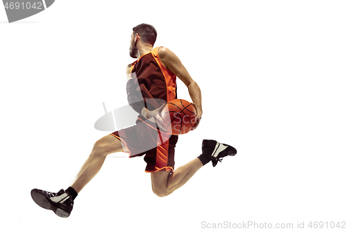 Image of Full length portrait of a basketball player with ball