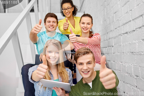 Image of high school students with tablet computers