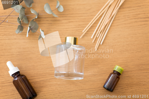 Image of aroma reed diffuser, essential oil and eucalyptus