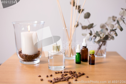 Image of aroma reed diffuser, candle and essential oil