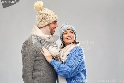 Image of happy couple in winter clothes