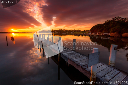 Image of Jetty with views to sunrise sky