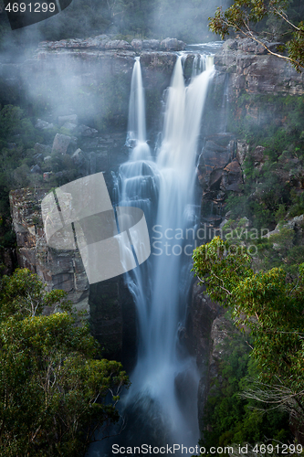 Image of Enchanting Carrington Falls with wind blowing spray off waterfall