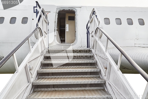 Image of Airport stairs to a plane