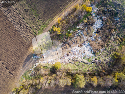 Image of Top areal view from drone above trash and garbage dump.