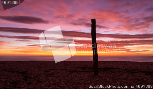 Image of Amazing vivid sunrise over the ocean from the beach