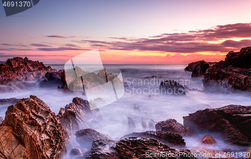 Image of Rocky coastal seascape at dawn