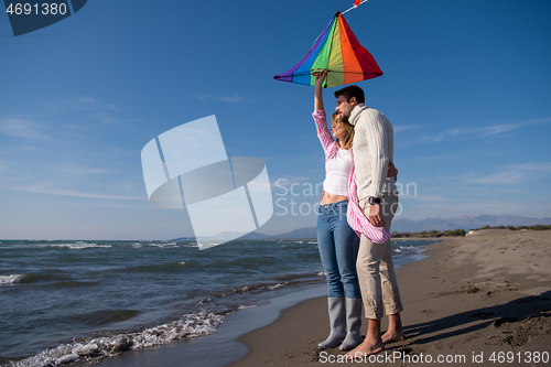 Image of Couple enjoying time together at beach