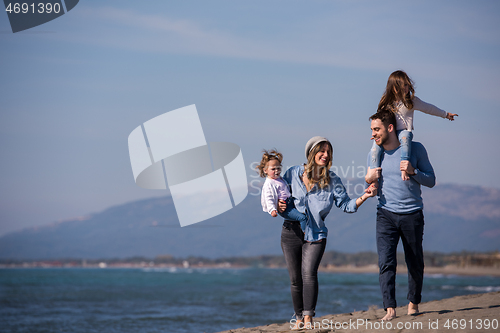 Image of Young family enjoying vecation during autumn