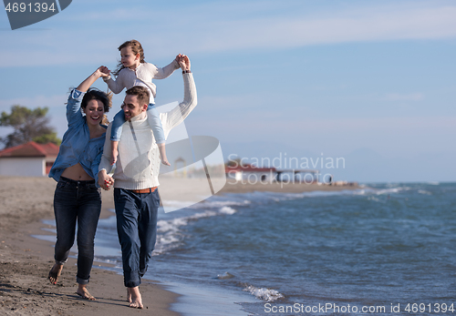 Image of Young family enjoying vecation during autumn