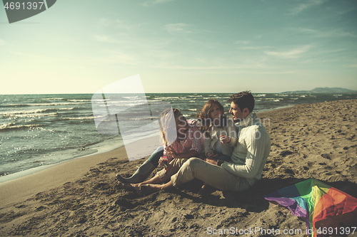 Image of family enjoying vecation during autumn day