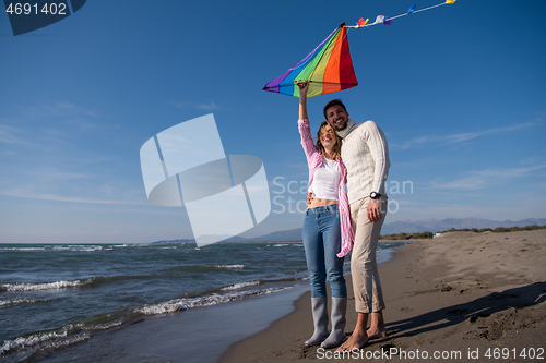 Image of Couple enjoying time together at beach