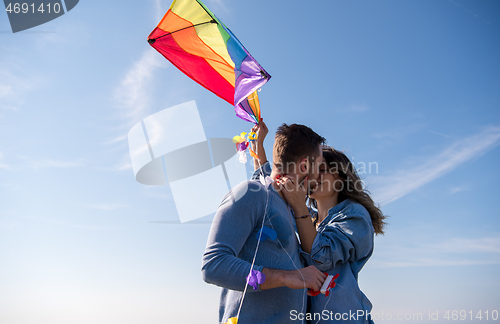 Image of Couple enjoying time together at beach