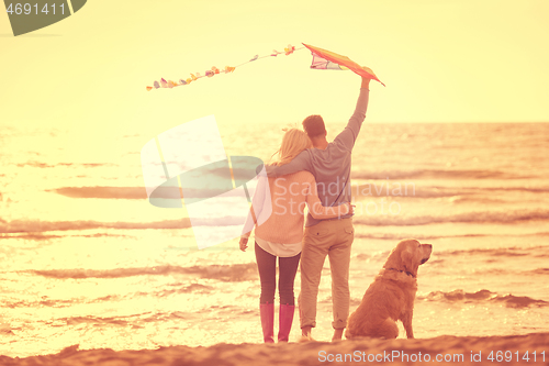 Image of happy couple enjoying time together at beach