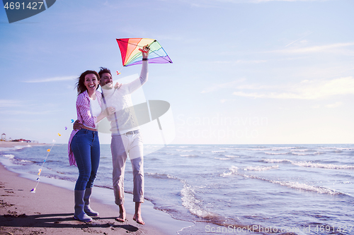 Image of Couple enjoying time together at beach