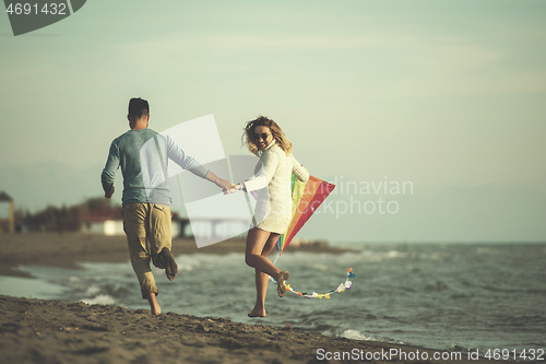 Image of Couple enjoying time together at beach