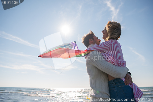 Image of Couple enjoying time together at beach