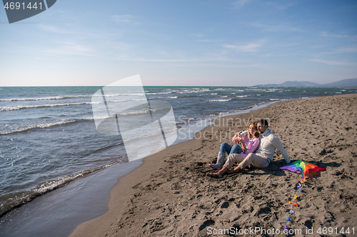 Image of young couple enjoying time together at beach