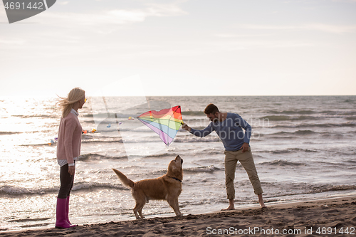 Image of happy couple enjoying time together at beach