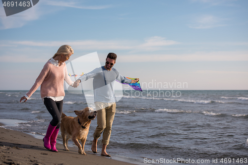 Image of happy couple enjoying time together at beach