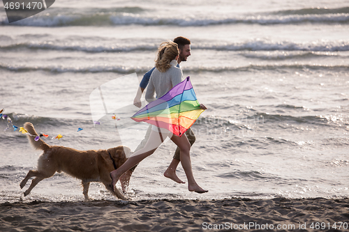 Image of happy couple enjoying time together at beach