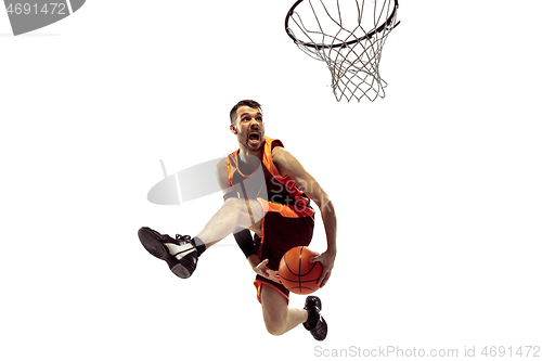 Image of Full length portrait of a basketball player with ball