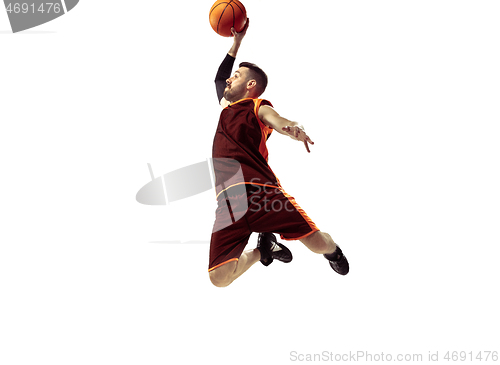 Image of Full length portrait of a basketball player with ball