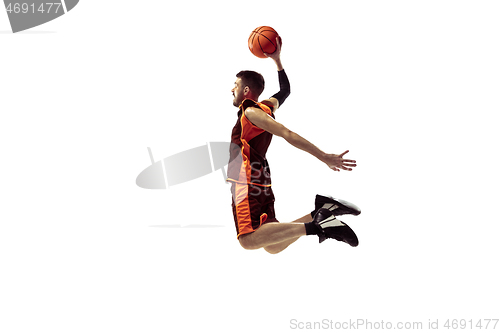 Image of Full length portrait of a basketball player with ball