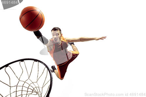 Image of Full length portrait of a basketball player with ball