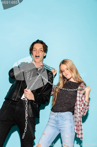 Image of Close up fashion portrait of two young pretty hipster teens