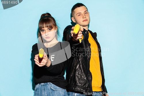 Image of Close up fashion portrait of two young pretty hipster teens