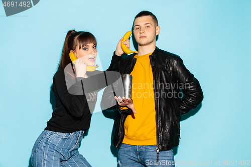 Image of Close up fashion portrait of two young pretty hipster teens