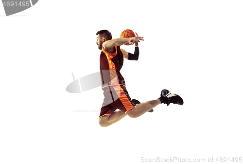 Image of Full length portrait of a basketball player with ball