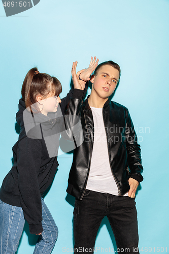 Image of Close up fashion portrait of two young pretty hipster teens