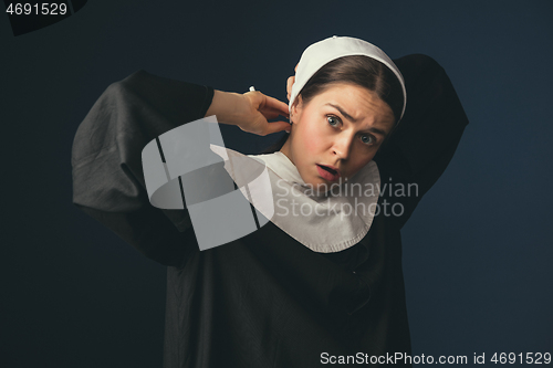 Image of Medieval young woman as a nun