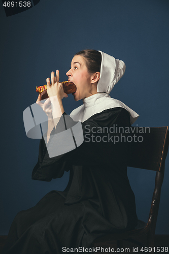 Image of Medieval young woman as a nun