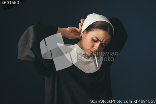 Image of Medieval young woman as a nun