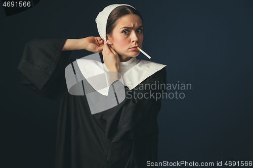 Image of Medieval young woman as a nun