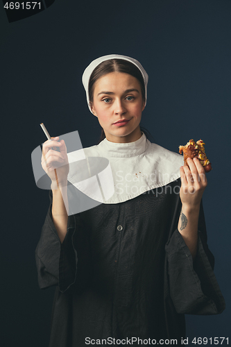 Image of Medieval young woman as a nun