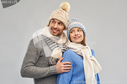 Image of happy couple in winter clothes