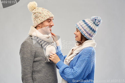 Image of happy couple in winter clothes