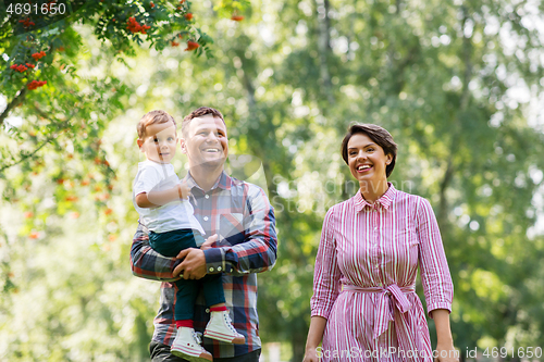 Image of happy family at summer park