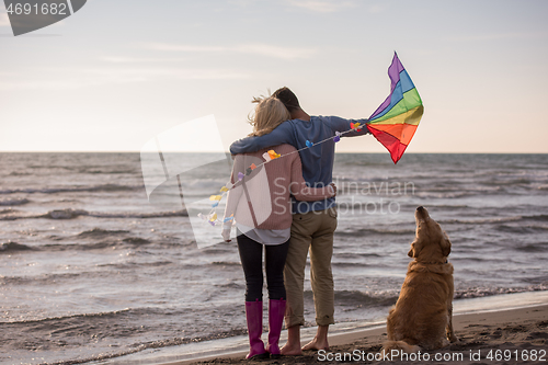 Image of happy couple enjoying time together at beach