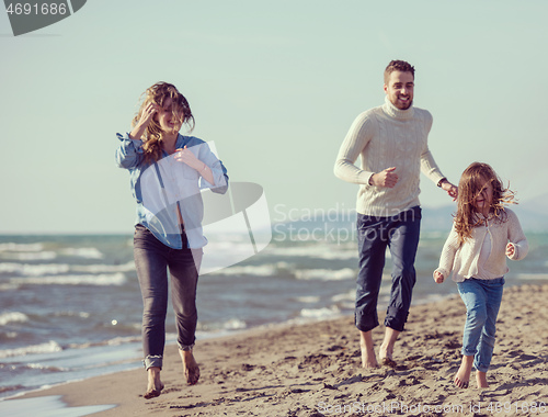 Image of Young family enjoying vecation during autumn