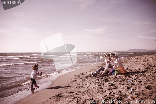 Image of family enjoying vecation during autumn day