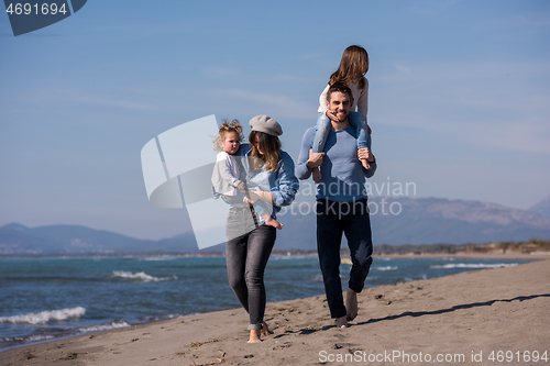 Image of Young family enjoying vecation during autumn