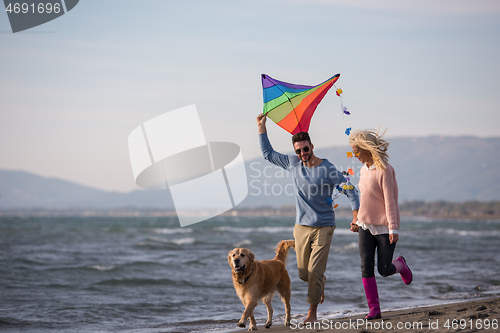 Image of happy couple enjoying time together at beach