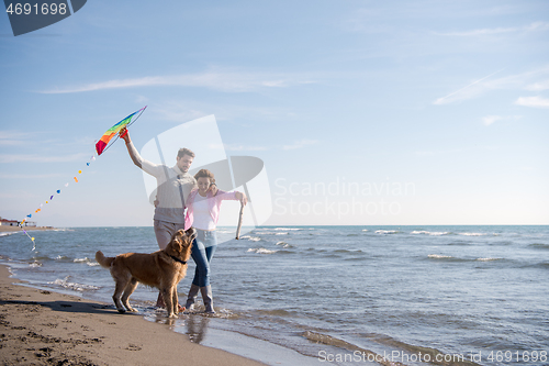 Image of happy couple enjoying time together at beach