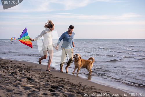 Image of happy couple enjoying time together at beach